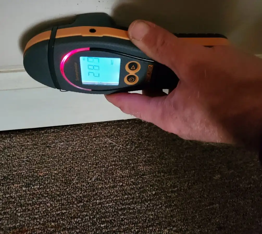 Moisture detection at baseboard during Storm Damage Restoration in Morristown